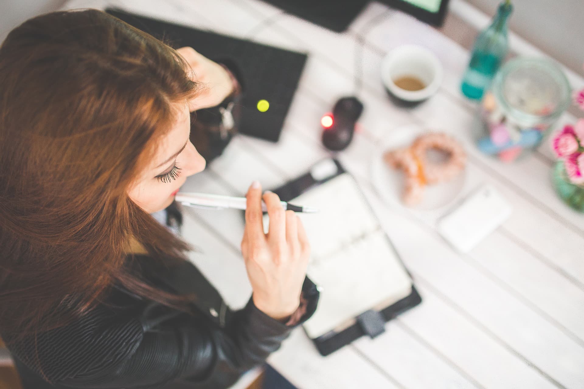 overview of woman working at desk