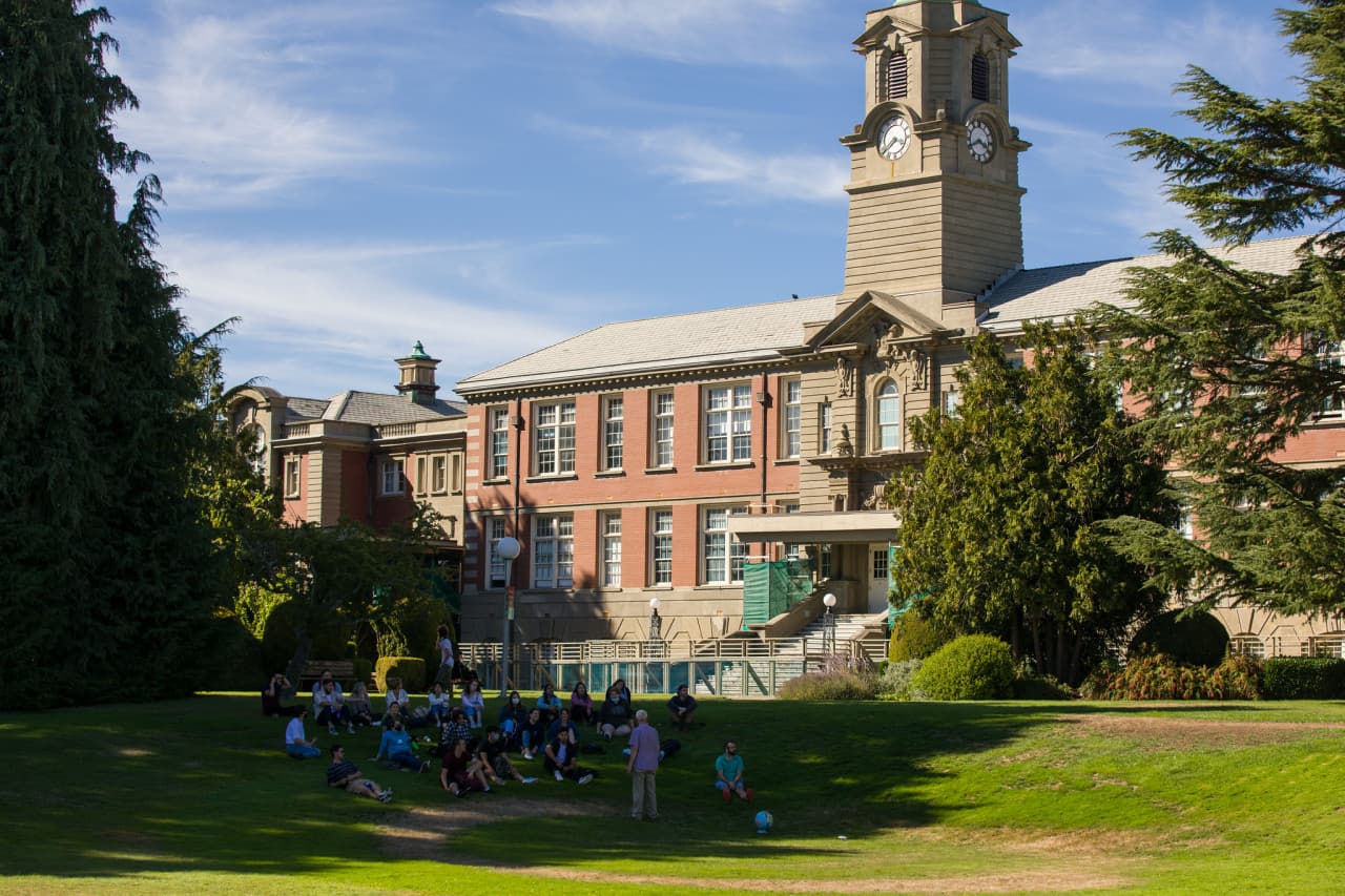 Camosun Campus - Students sitting in field