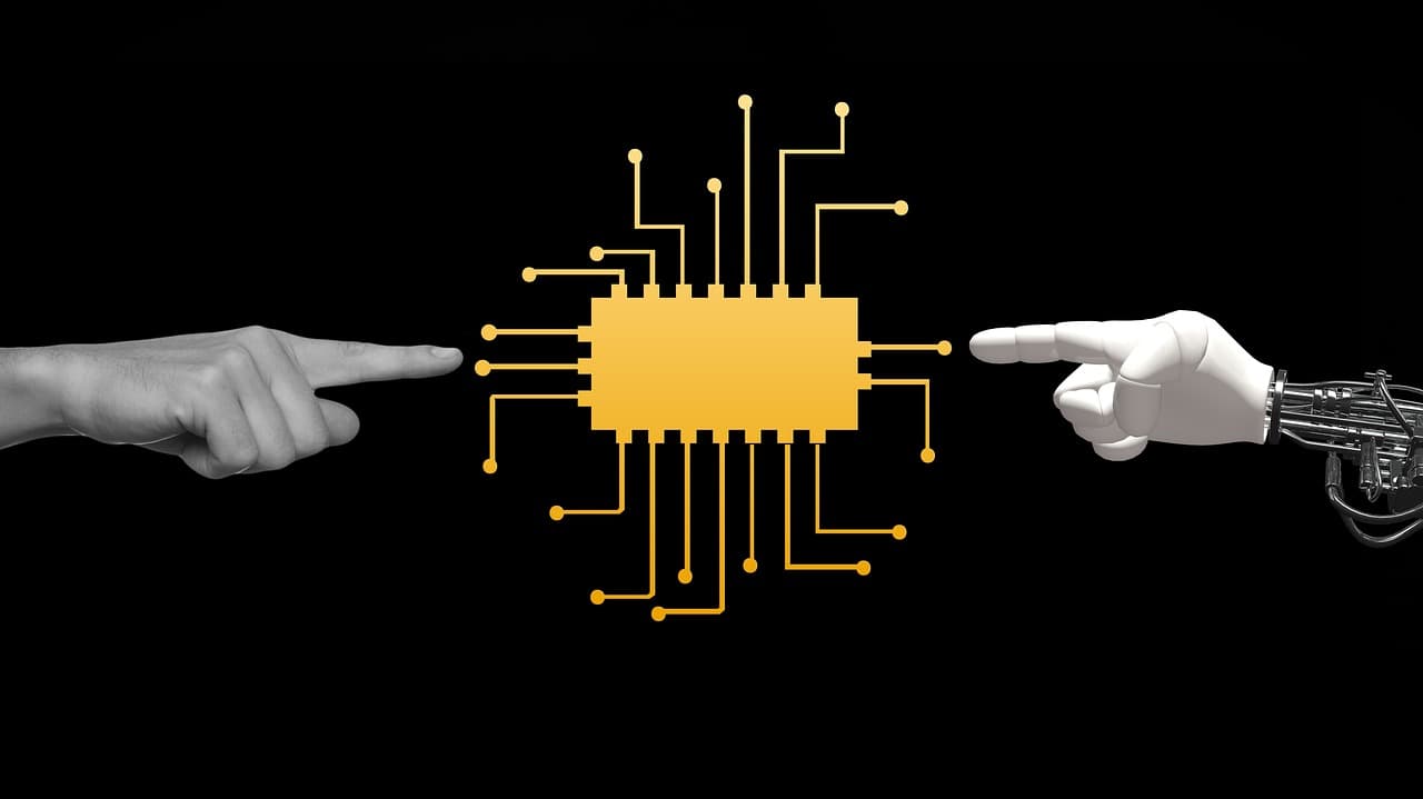 graphic of human hand and robot hand touching microchip with index fingers