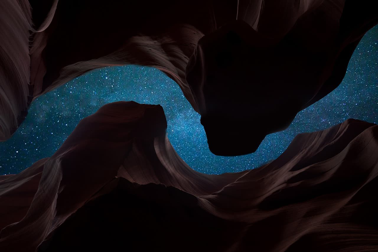 night sky viewed through canyon ceiling